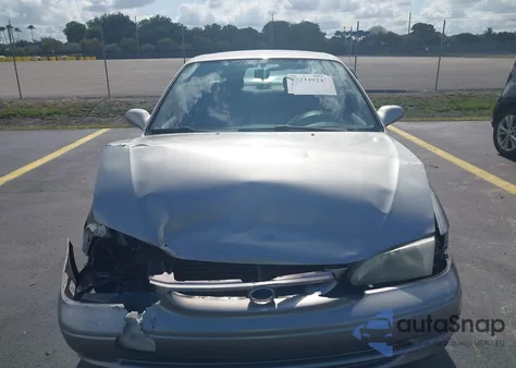 1998 Toyota Corolla Le из США, поврежденный, VIN 2T1BR18E2WC057951